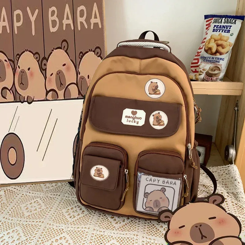 sac dos nylon beige accents marron blanc motifs ours poches multiples étudiant voyage décontracté