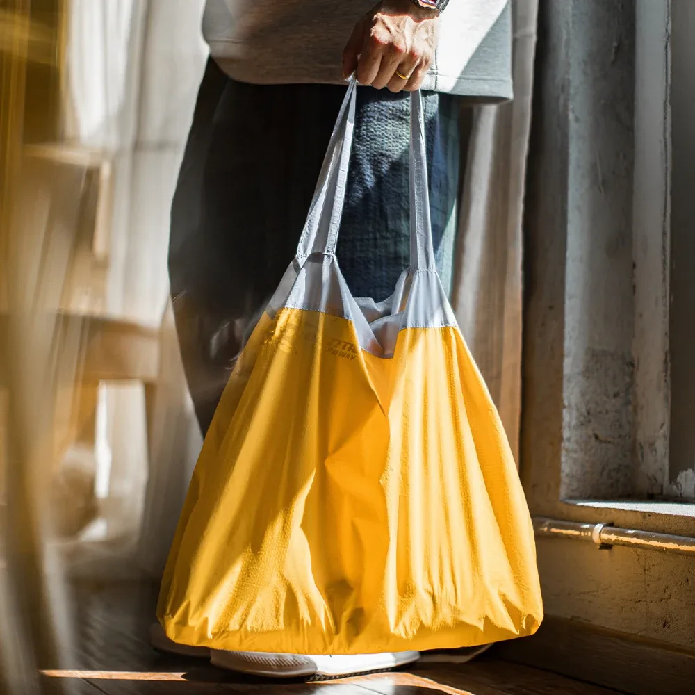 maden – sac fourre-tout pliable d'extérieur, sac de voyage étanche de grande capacité, poignées contrastées, sacs de shopping de banlieue ultra-légers