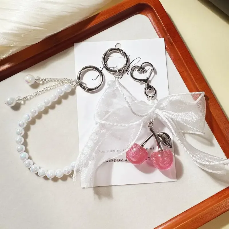 1/2 pièces mode perle cerise dentelle porte-clés chaîne sac charme tressé corde à la mode porte-clés pour sac à dos pendentif accessoires