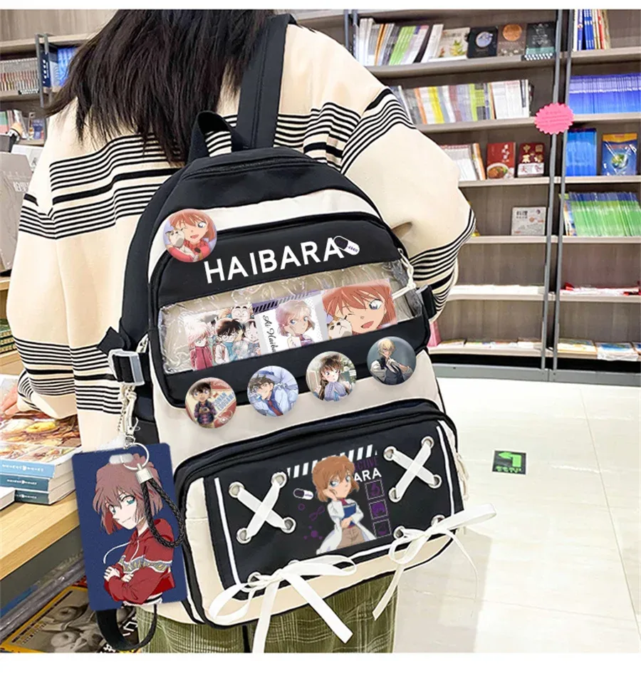 sac dos nylon animaux personnages beige noir poche avant appliques badge couverture souple ceinture air unisexe