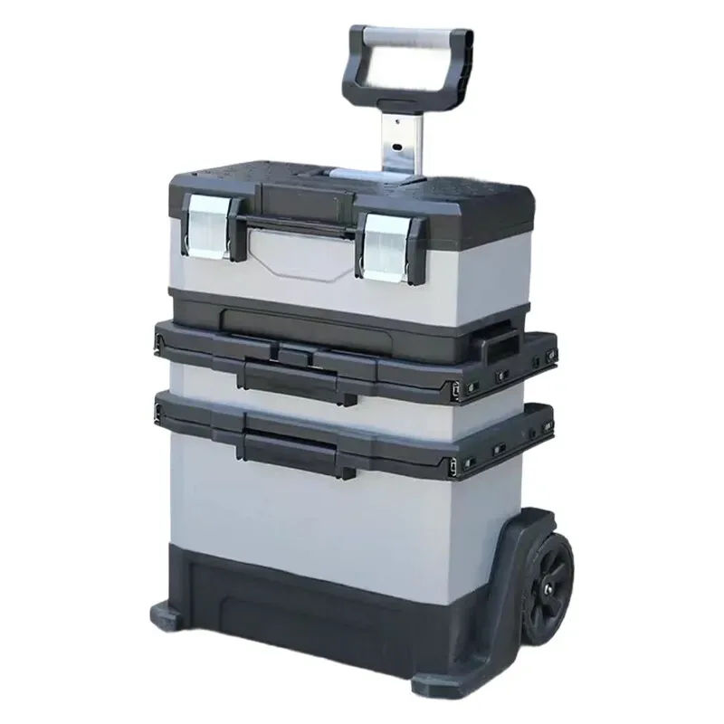 valise aluminium grise roulettes fixes poignées bleues compartiments superposés transport voyage travaux hausse atelier
