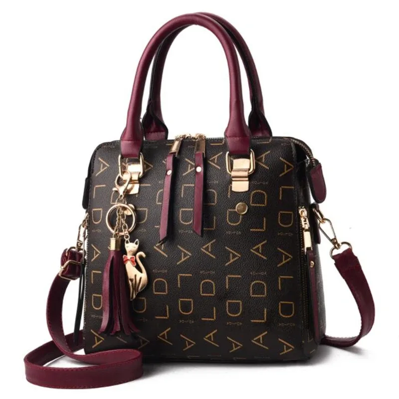 sac à main en cuir pu avec lettres anglaises pour femmes, sac à poignée supérieure avec pompon, sac à bandoulière de luxe de grande capacité, fourre-tout design
