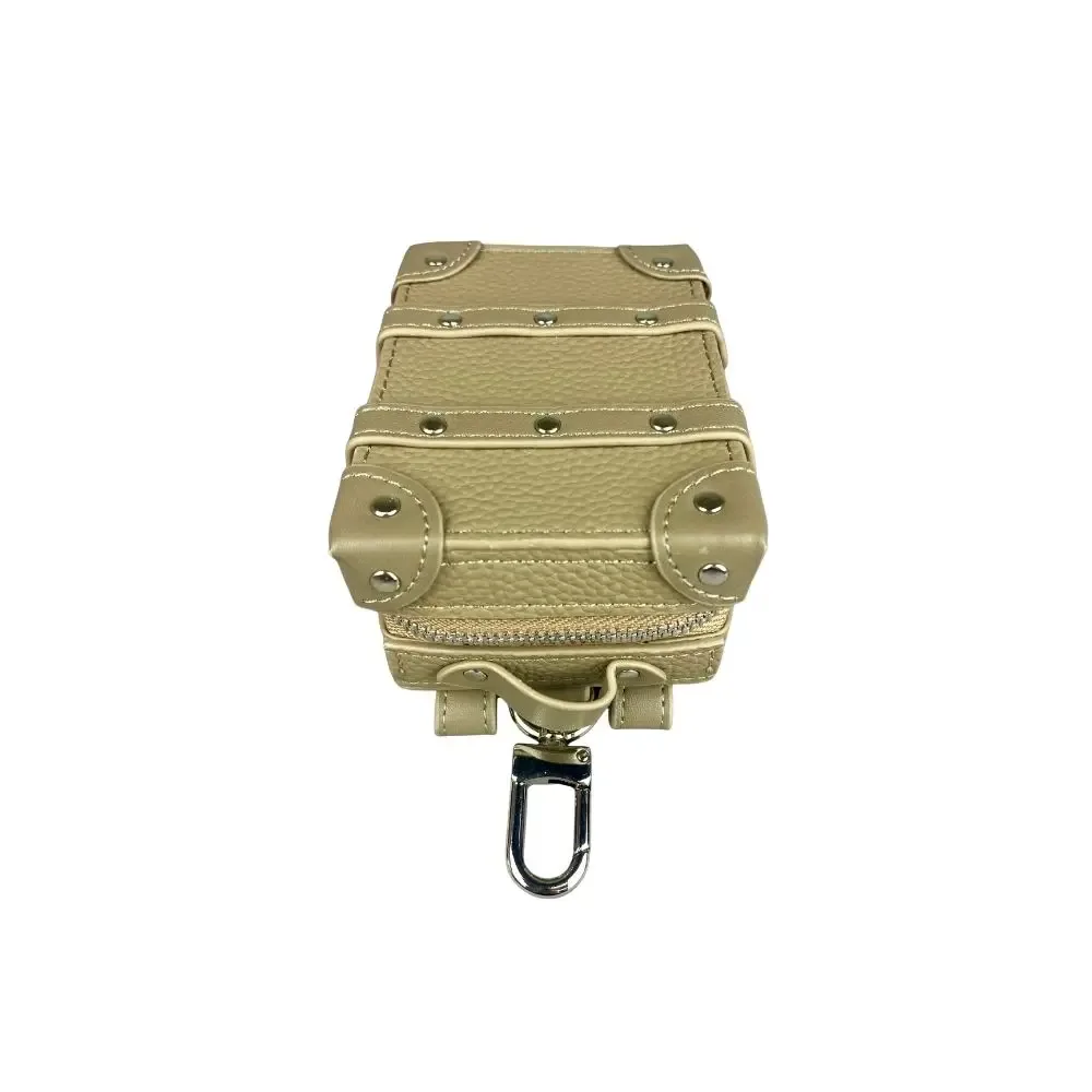 mini breloque de sac porte-clés de valise de luxe en cuir véritable – pendentif de coffre clouté avec rangement (écouteurs, clés, rouge à lèvres, pièces de monnaie)