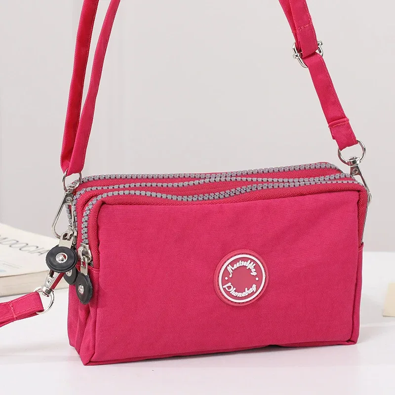 sac à bandoulière de grande capacité pour femmes, sac à bandoulière simple avec trois fermetures éclair pour téléphone et sac de rangement à changement ample