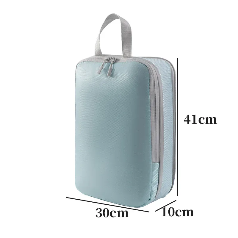 organisateur voyage polyester blanc bandes grises format rectangulaire poignées grises compression vêtements articles toilette rangement valise