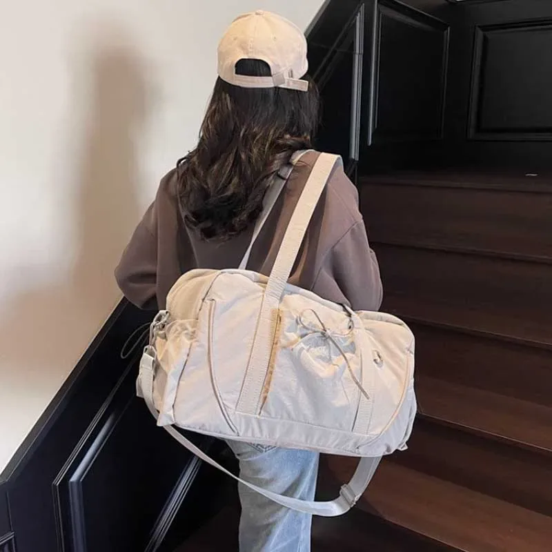 nouveau sac de voyage grande capacité épaule portable sac à bagages sac de rangement de voyage sacs d'embarquement sport fitness sacs pour femmes сумка