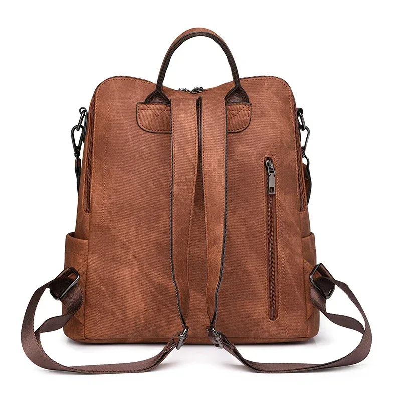 sac dos cuir texturé marron poches zippées ouvertes bandoulière arquée poche informatique imperméable jacquard vieille mode sac voyage femmes