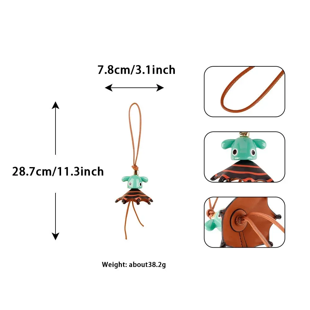 breloque de sac en cuir véritable avec grand œil et pompon, inspirée des créateurs de luxe, porte-clés à franges pour sacs à main, sacs à dos et accessoires de sac fourre-tout pour femmes