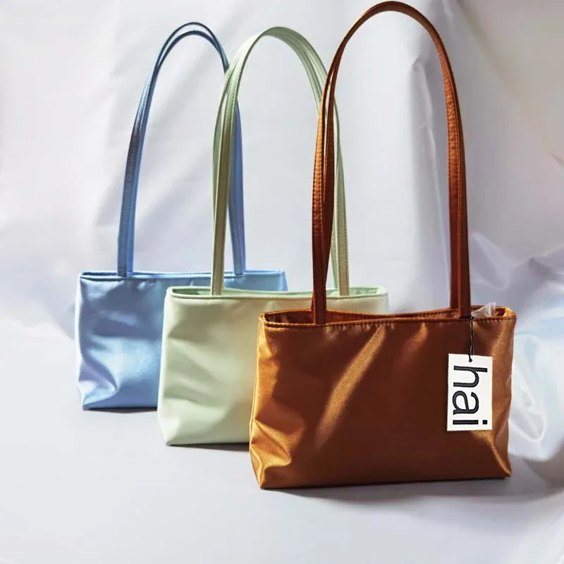 sacs à bandoulière de luxe en soie pour femmes, sac carré sous les bras, sac de banlieue de marque célèbre, fourre-tout macaron de couleur contrastée