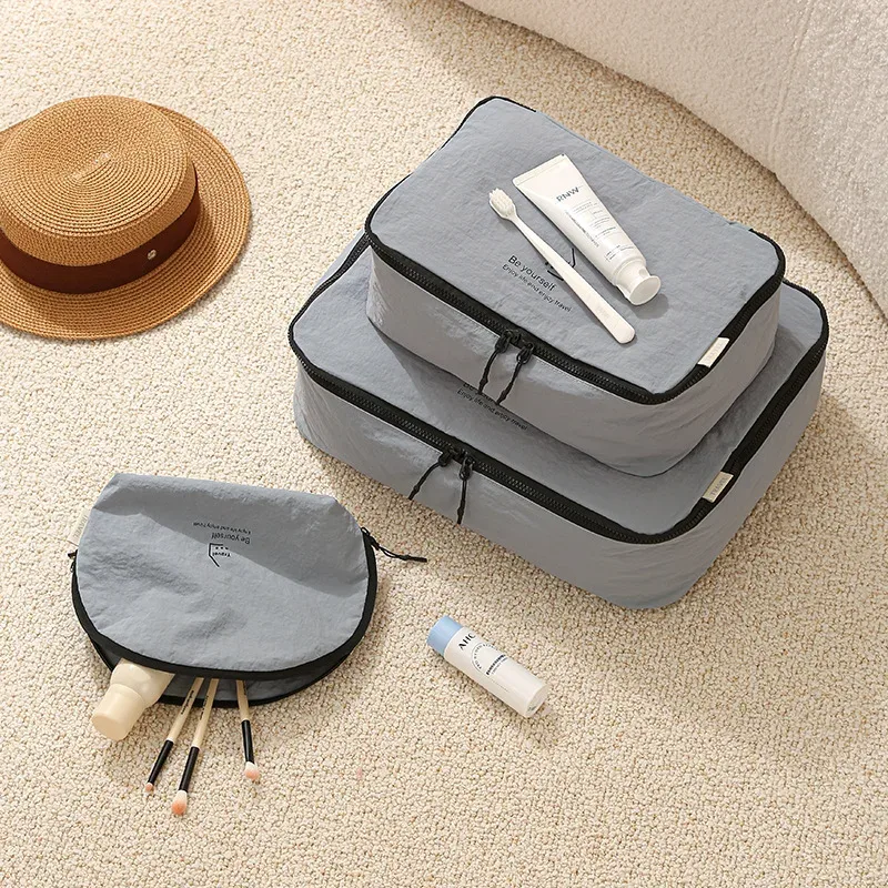 ensemble de cinq sacs de rangement de voyage compressibles en taslon, sac de rangement pour sous-vêtements, sac de rangement portable, pour organiser et trier les affaires en voyage.