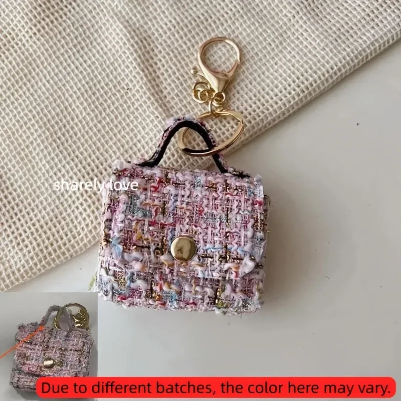 porte clés sac mini tweed bleu rose noir poignée métallique dorée monnaie écouteurs accessoire voyage compact