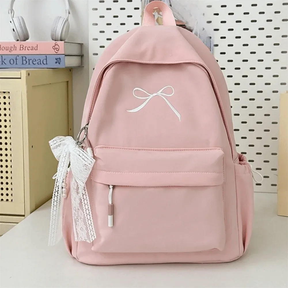 sac à dos portable avec nœud brodé pour filles, cartable en nylon de couleur unie pour étudiants, sac à dos de voyage léger de grande capacité