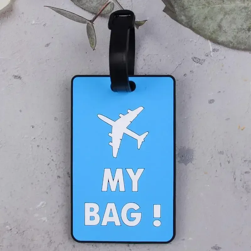 étiquette bagage plastique motif world traveler my tour avion bleu rouge rose vert marron identité voyage croisière