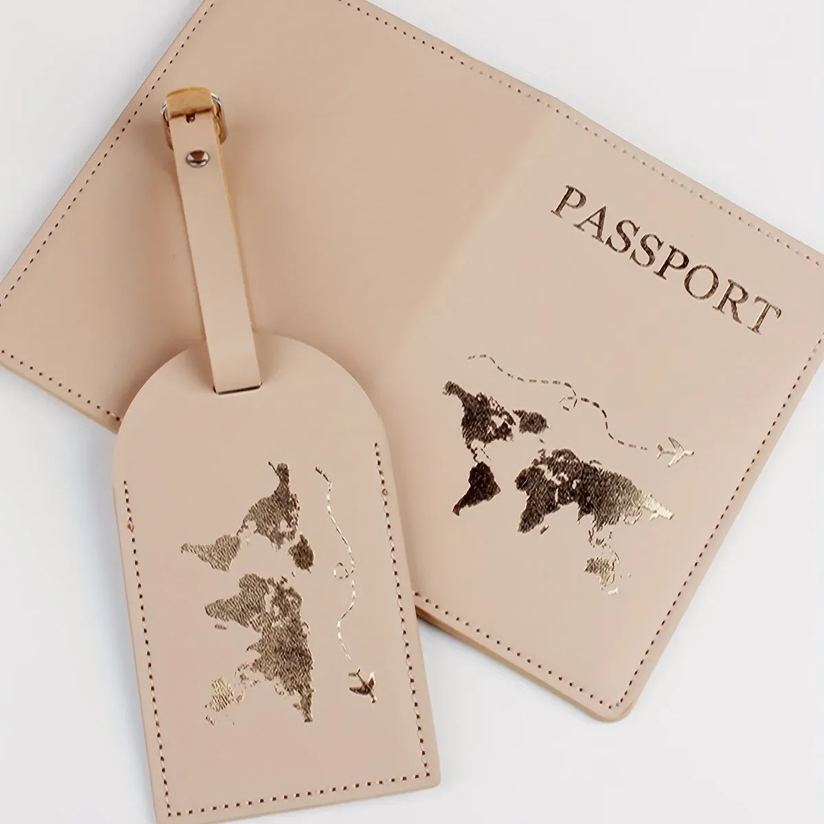 étiquette bagage cuir verni rose carte monde dorée voyage identification passeport porte nom adresse