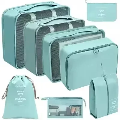 organisateur voyage polyester beige clair sac rangement vêtements chaussures sous-vêtements pochettes transparentes cubes modularité transport