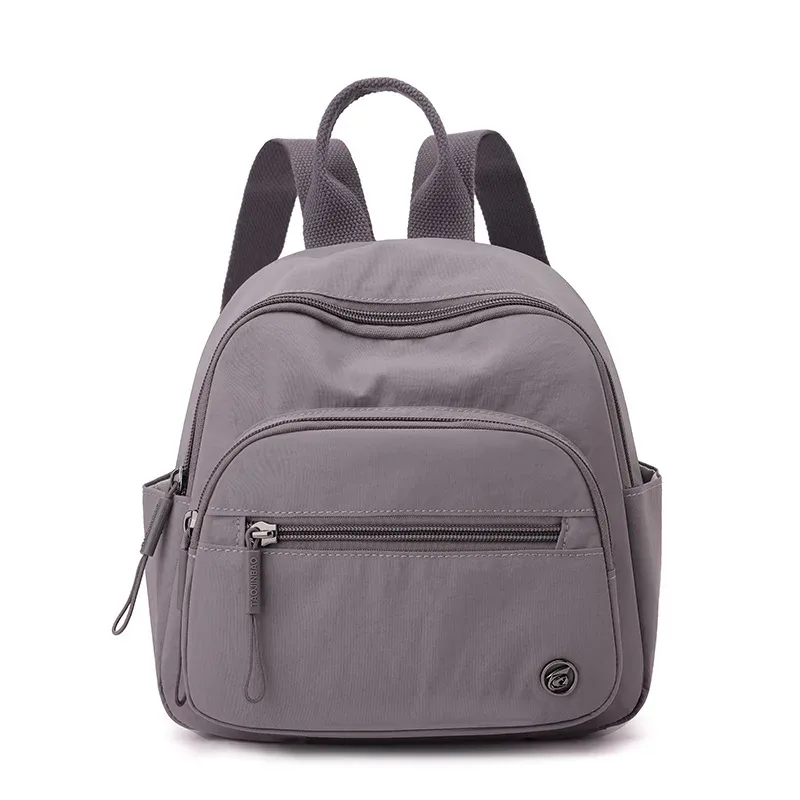 sac à dos portable en nylon pour femme, couleur unie, léger, multi-poches, décontracté, tendance, imperméable, nouveau cadeau 2026