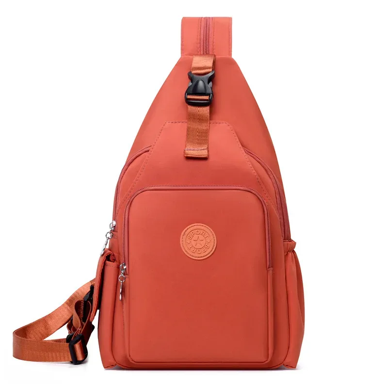 sac dos oxford tissu orange marron bandoulière arquée poignée rétractable loquet verrouillable intérieur chaussures bio coton capacité voyage