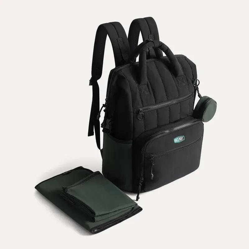sac dos polyester beige accents verts poches multiples grande capacité maternité sorties mains libres bébé ordinateur portable