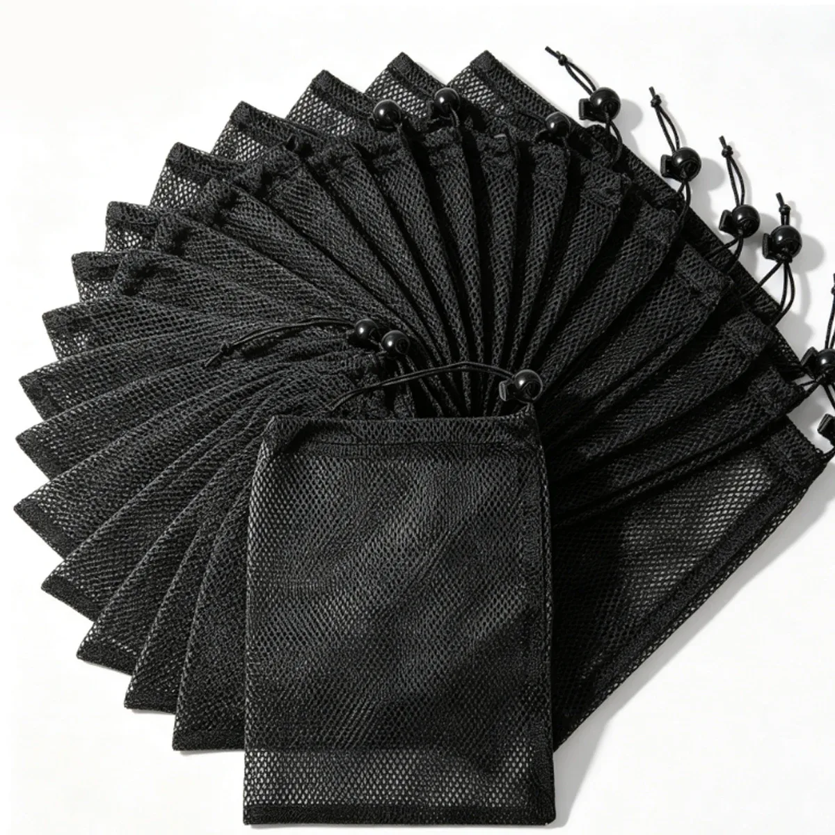 organisateur voyage sac rangement nylon noir sport maille serrage cordon 30x40cm compression usage transport