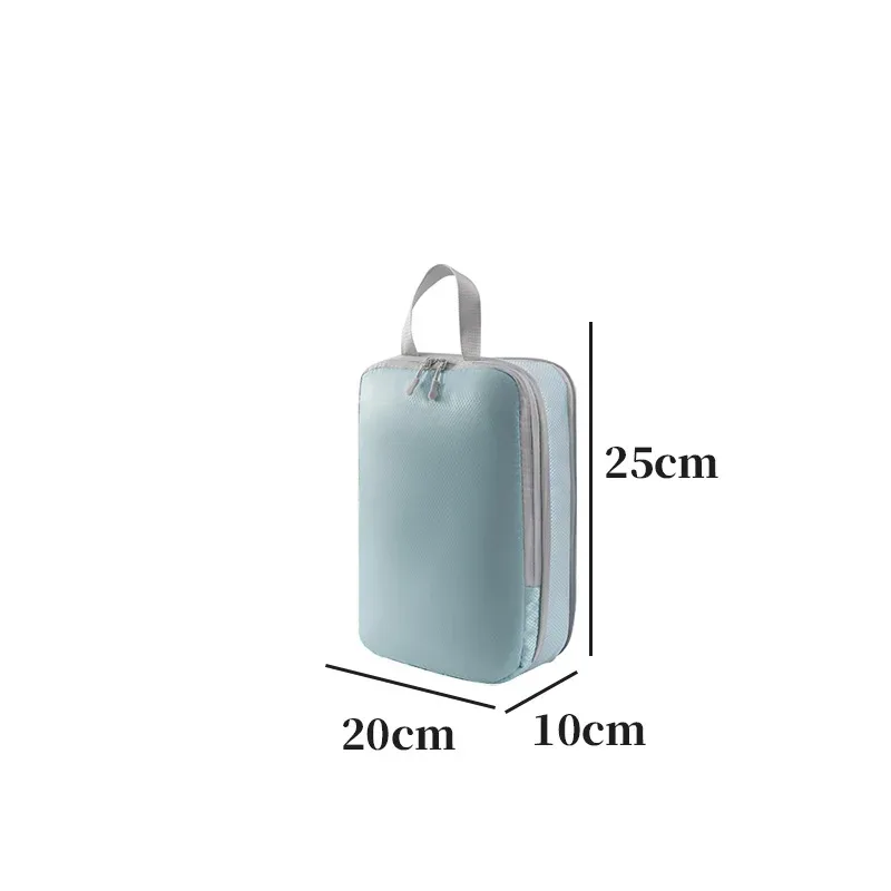 organisateur voyage polyester blanc bandes grises format rectangulaire poignées grises compression vêtements articles toilette rangement valise