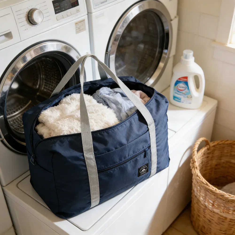 sac de voyage pliable de grande capacité, imperméable et résistant à l'usure, peut être porté à la main et stocké sur une épaule à la maison.