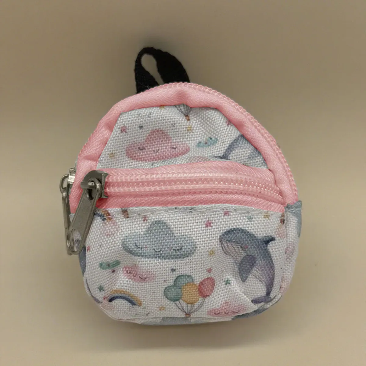 sac dos nylon petit format ovale fermeture glissière poche latérale double épaule poches latérales couleur vivante usage voyage
