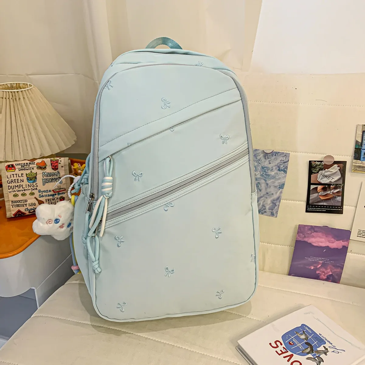 Sacs à dos tendance en nylon brodés avec nœud, collection Printemps/Été 2026, nouveaux sacs polyvalents grande capacité pour étudiants et trajets quotidiens