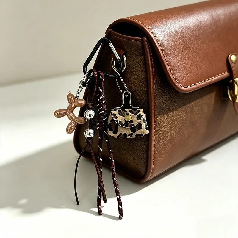 porte-clés tendance imprimé léopard, pendentif de sac, accessoires pour sac à main et sac à dos, décor en corde tressée maillard