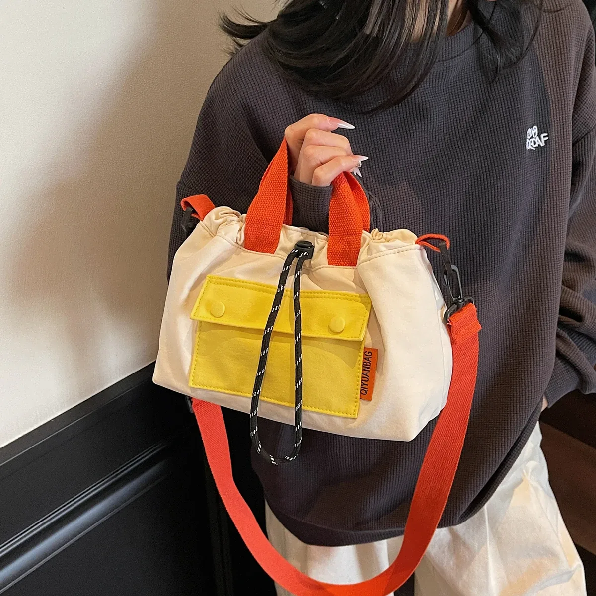 le nouveau sac messager unisexe, sac à bandoulière fonctionnel extérieur, sac à bandoulière de banlieue, sac de rangement, sac à dos contrasté féminin