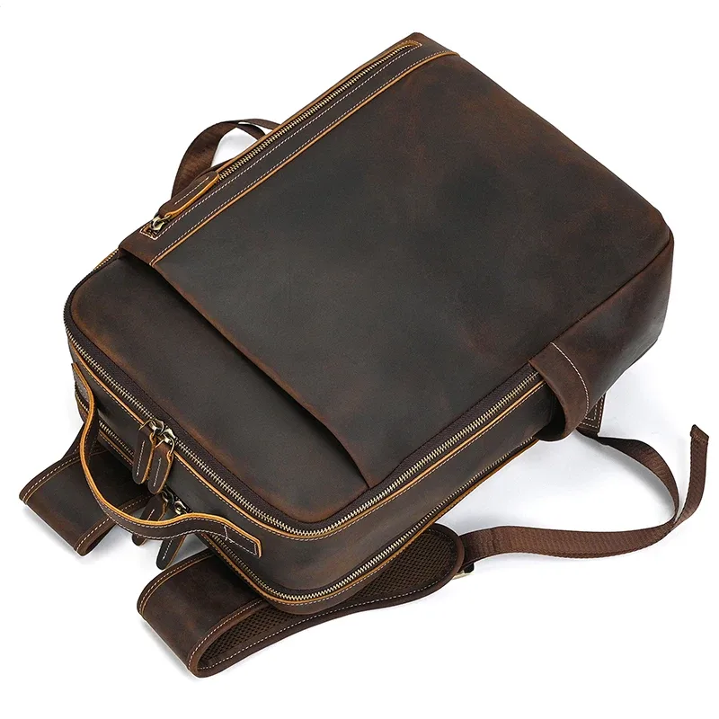 sac dos cuir vache marron polyester doublure 20 35 litres poches latérales grande ouverture usage voyage hommes