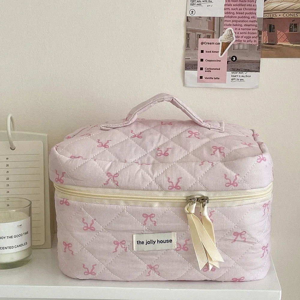 trousse cosmétique tissu coton rose pâle motif rubans matelassée fermeture glissière voyage femmes maquillage