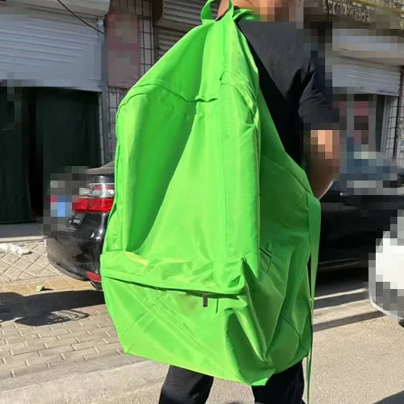 sac dos polyester violet vert bleu rouge jaune rose forme trapézoïdale poches latérales fermeture glissière usage voyage grande capacité