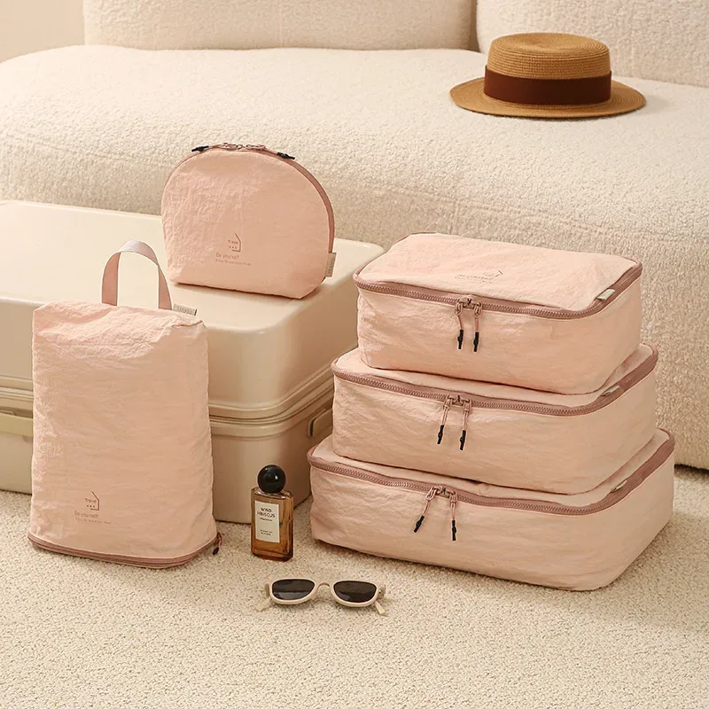 Ensemble de cinq sacs de rangement de voyage compressibles en taslon, sac de rangement pour sous-vêtements, sac de rangement portable, pour organiser et trier les affaires en voyage.