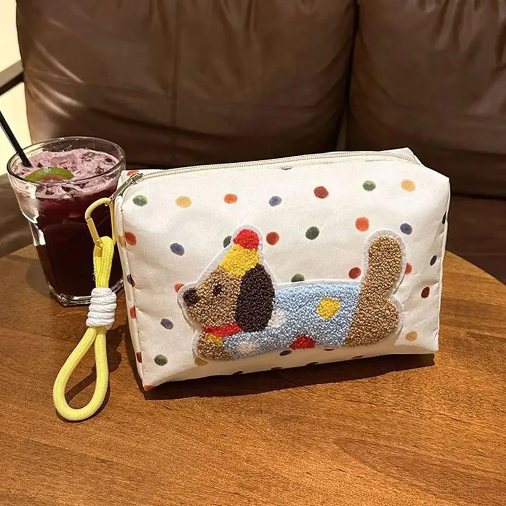 trousse polyester blanche chien tricoté pois colorés sangle poignet organisation maquillage toilette voyage femmes