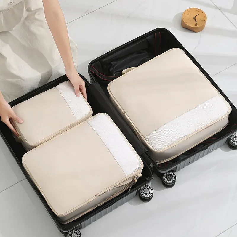 organisateur voyage polyester beige compression cube sac rangement vêtements transport simple élégant imperméable antipli