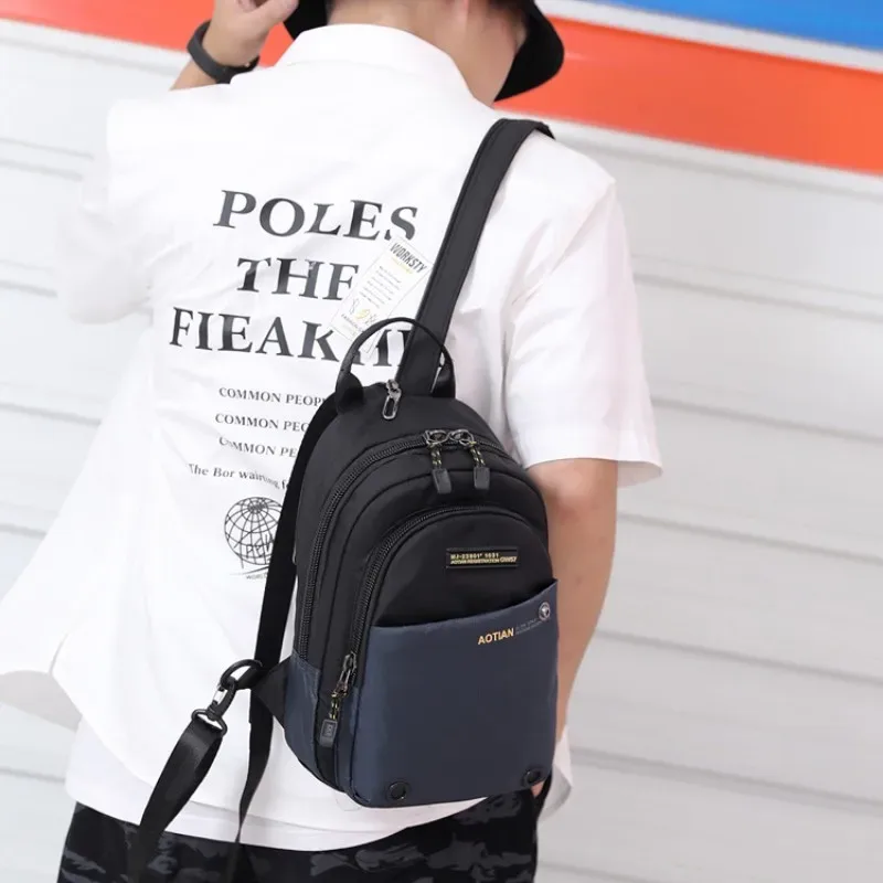 sac dos nylon bleu marine noir polyvalent compact grande capacité voyage sport jour usage courant