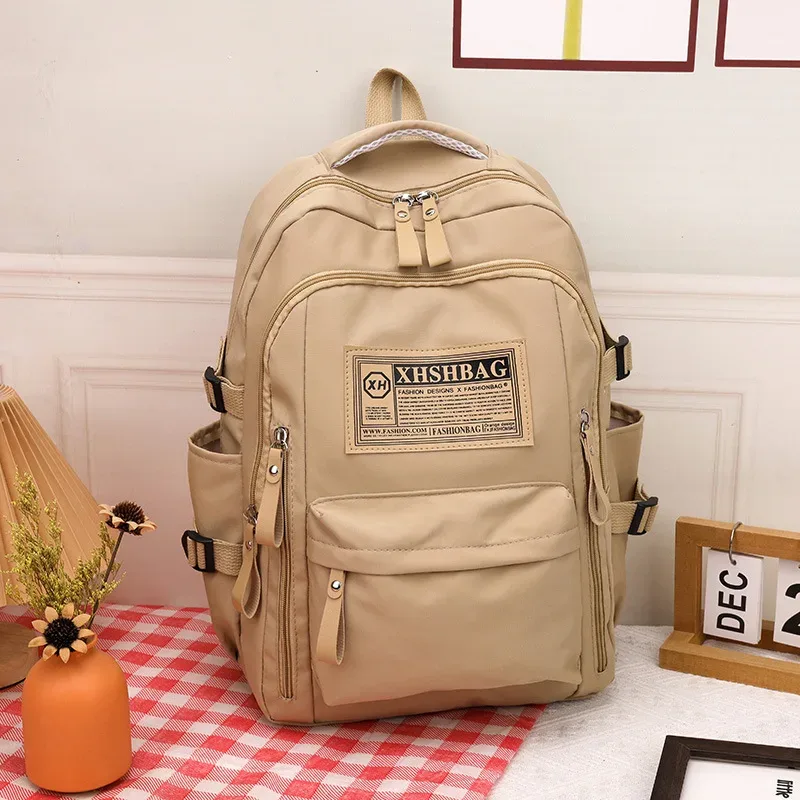 sac dos nylon solide beige rouge noir kaki décontracté poignée souple fermeture éclair usage journalier