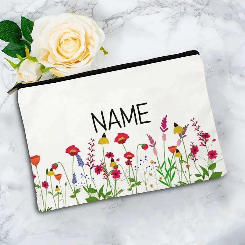 trousse toilette toile blanc motif fleurs vert fermeture éclair pliable extensible décontracté femme voyage cosmétiques