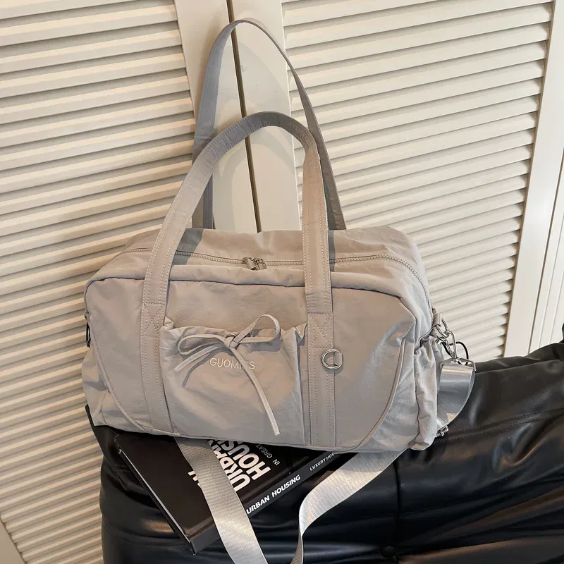 nouveau sac de voyage grande capacité épaule portable sac à bagages sac de rangement de voyage sacs d'embarquement sport fitness sacs pour femmes сумка