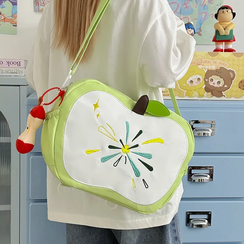 sac à bandoulière grande capacité apple 2026, nouveau sac à dos portable contrasté pour les trajets quotidiens, sac de rangement tendance et décontracté