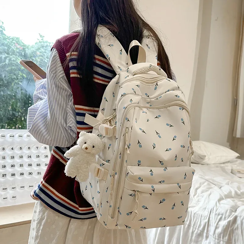 sac à dos décontracté à imprimé floral grande capacité pour filles, sac d'école en nylon imperméable, capacité pour ordinateur portable 14 pouces, style frais et doux