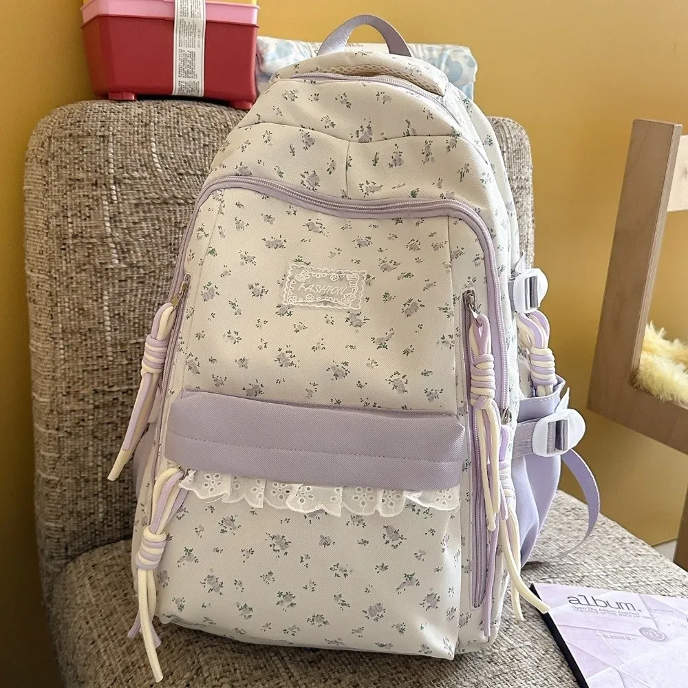 sac à dos à imprimé floral avec décor en dentelle, ultra léger, avec pendentif étoile, esthétique fraîche, grande capacité, idéal pour les trajets quotidiens.