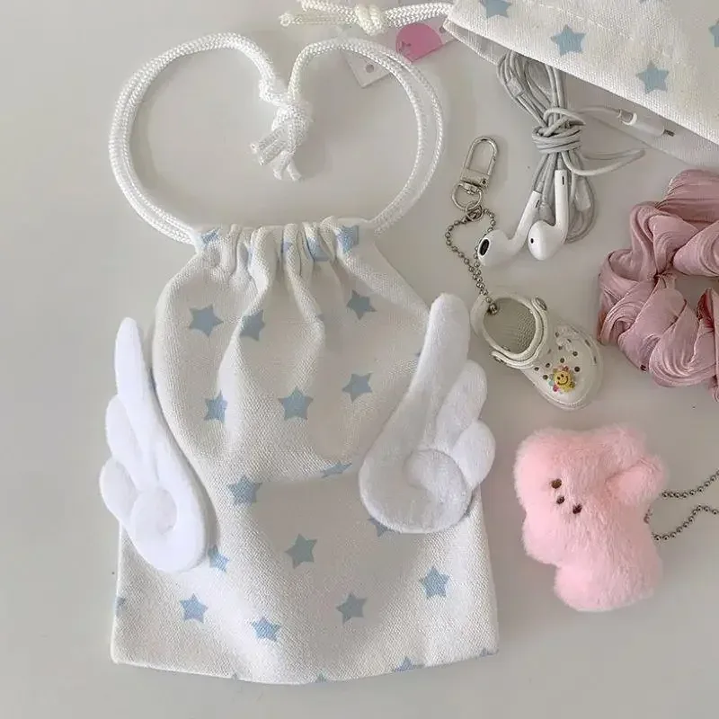 toile chaude ailes d'ange étoiles sac de maquillage ins cordon sac de rangement portable bundle poche anti-poussière sac de rangement organisateur sac