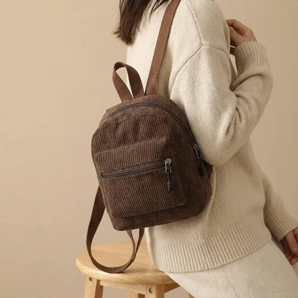 Mini sac à dos polyvalent en velours côtelé de couleur unie, léger, avec fermeture éclair, double bandoulière, multi-poches, sac à dos vintage pour le quotidien et les voyages
