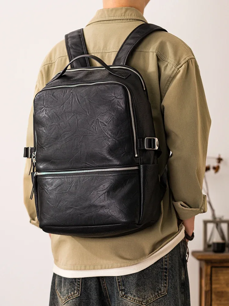 pndme voyage en plein air de haute qualité en cuir véritable hommes noir sac à dos mode décontracté luxe en cuir de vache ordinateur sac à dos