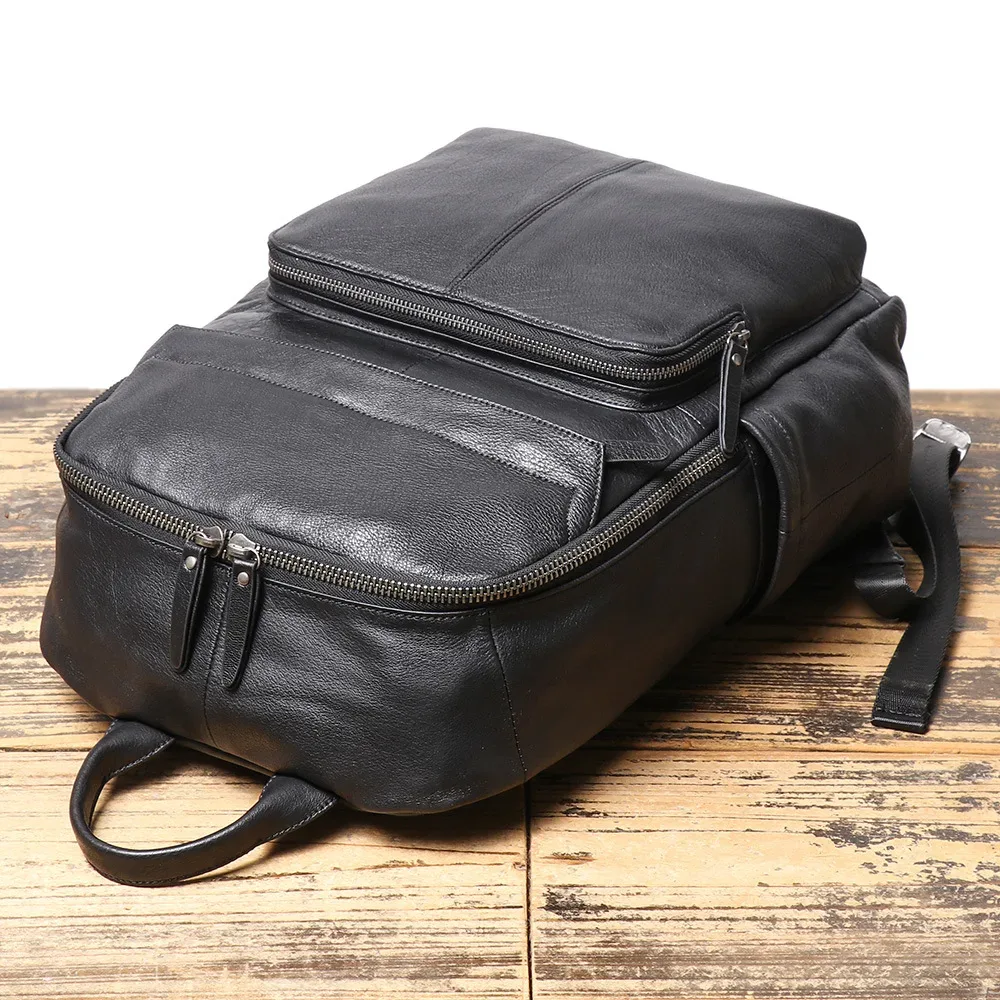sac dos cuir vache beige texture rugueuse bandoulière arquée poches latérales supérieure arrière capacité grande polyester jacquard usage voyage business
