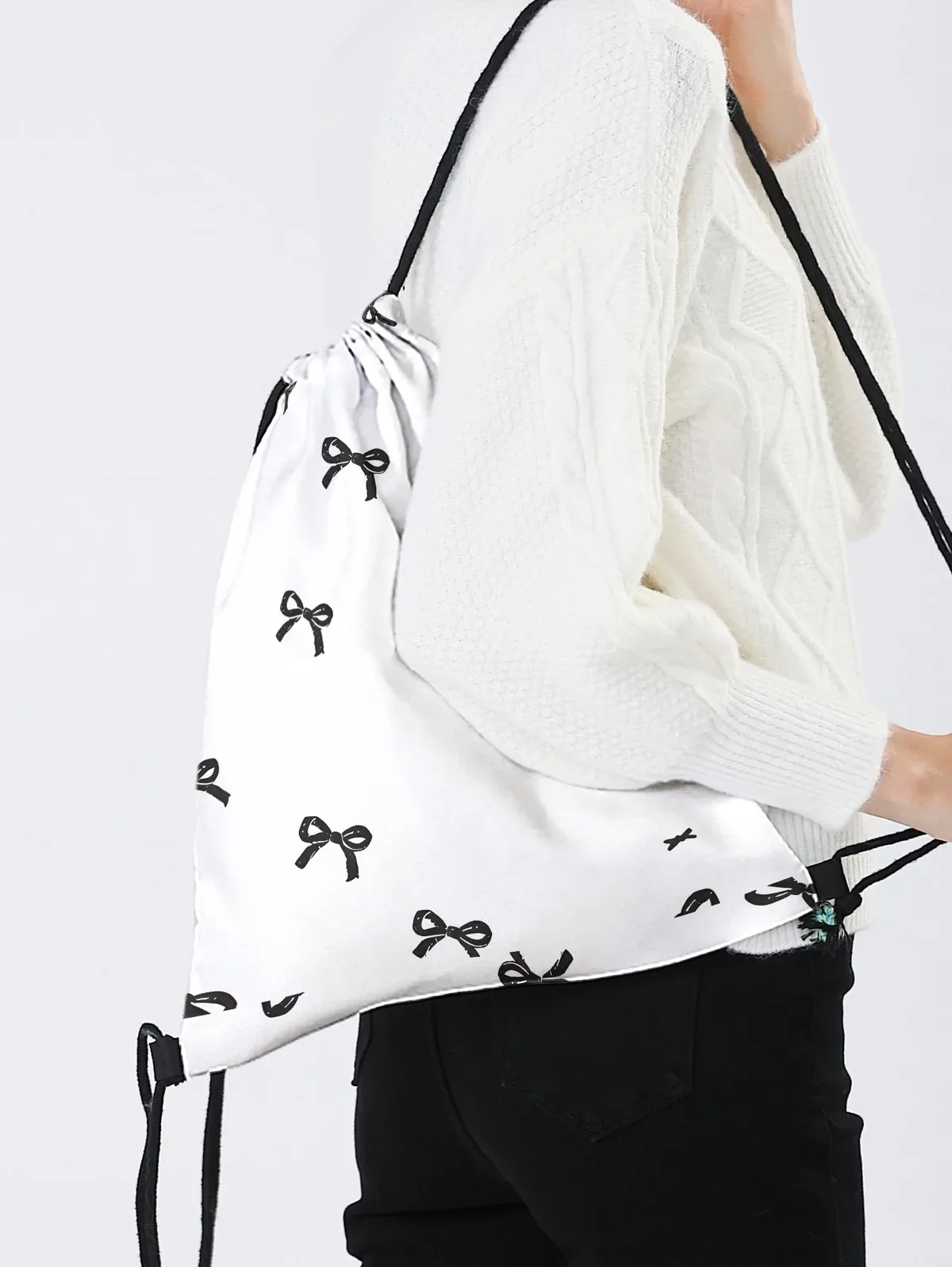 sac à dos noir à cordon de serrage imprimé nœud papillon, sac de sport léger pour la salle de sport, le yoga, les voyages, l'école, le shopping et les trajets quotidiens