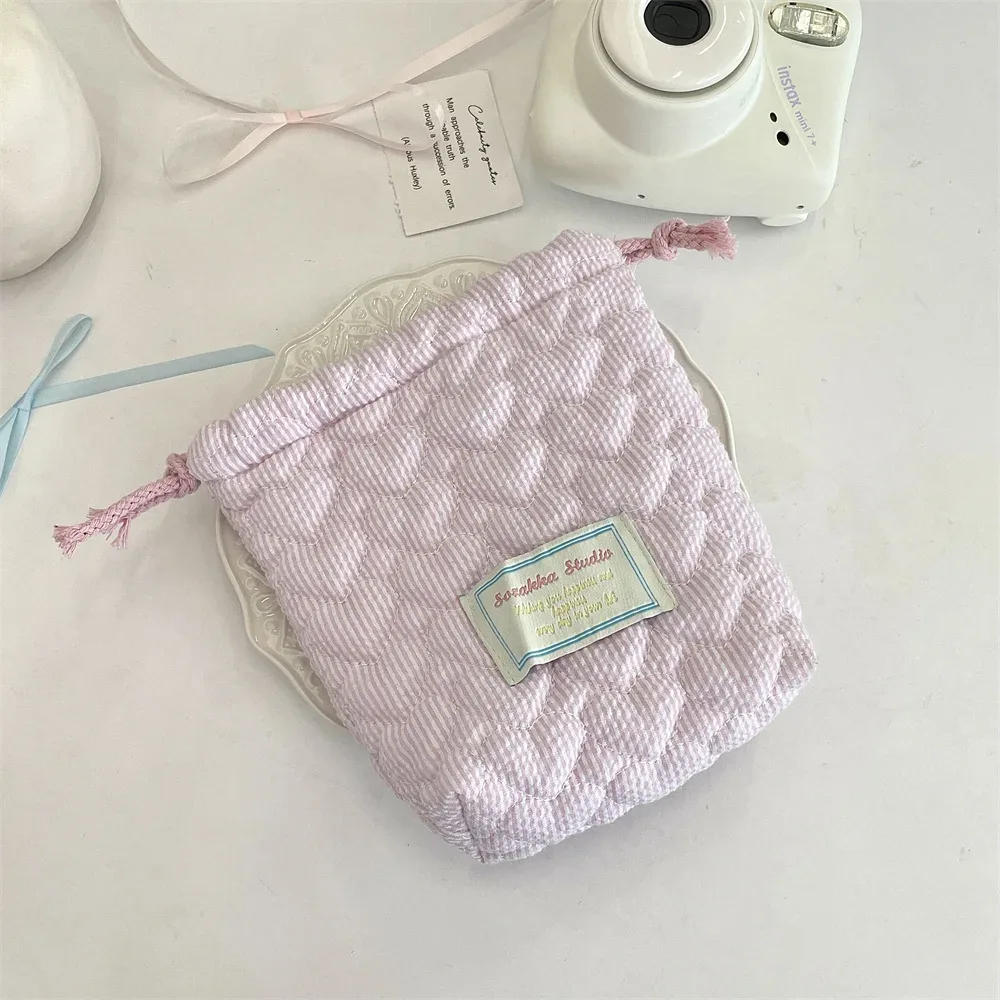pochette de maquillage matelassée à motif étoile avec cordon de serrage, pochette de rangement souple pour appareil photo, rouge à lèvres, petit organisateur d'électronique