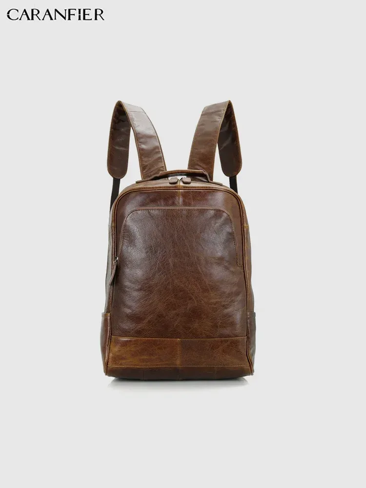 sac dos cuir véritable marron foncé poignées boucles métalliques pochette latérale bandoulière arquée fermeture éclair informatique voyage
