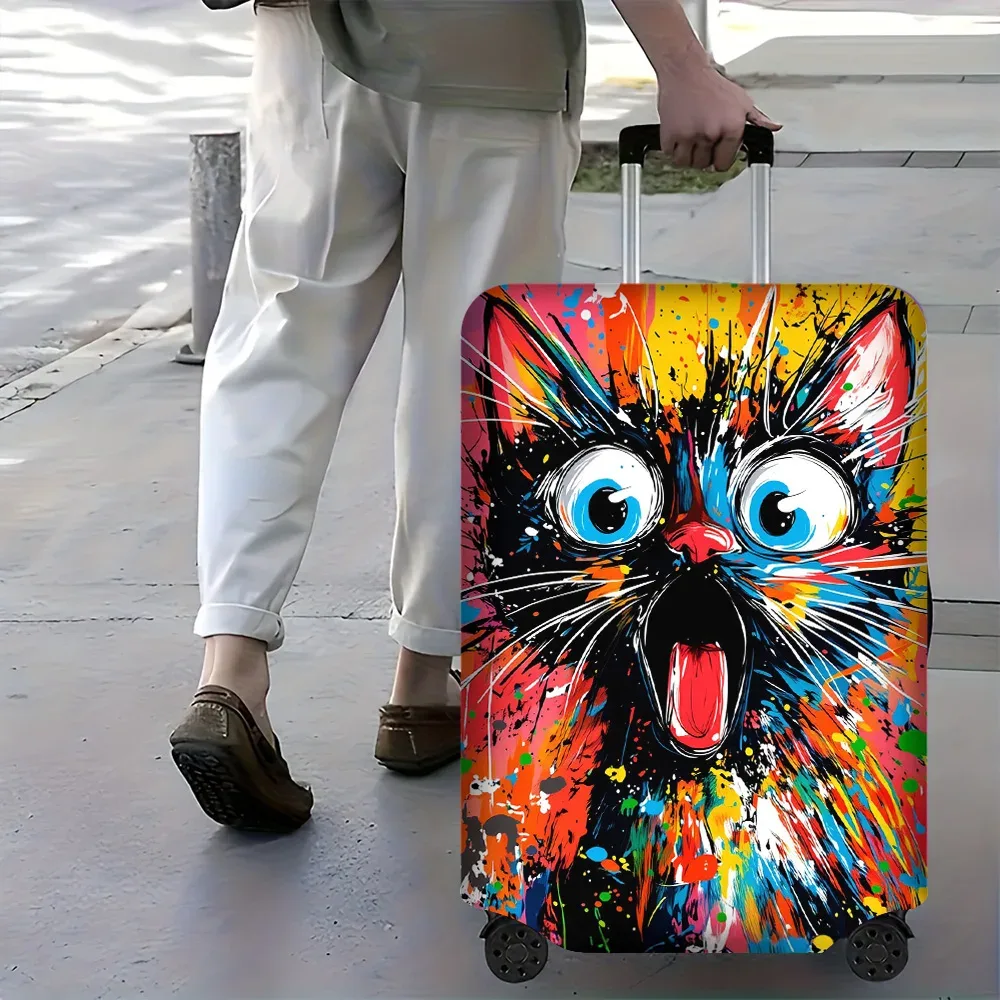 housse valise polyester visage chat motifs couleurs jaunes rouges bleues noires forme rectangulaire protection voyage